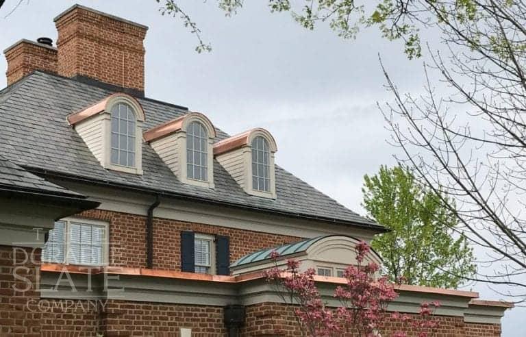 slate roof house with copper embellishments