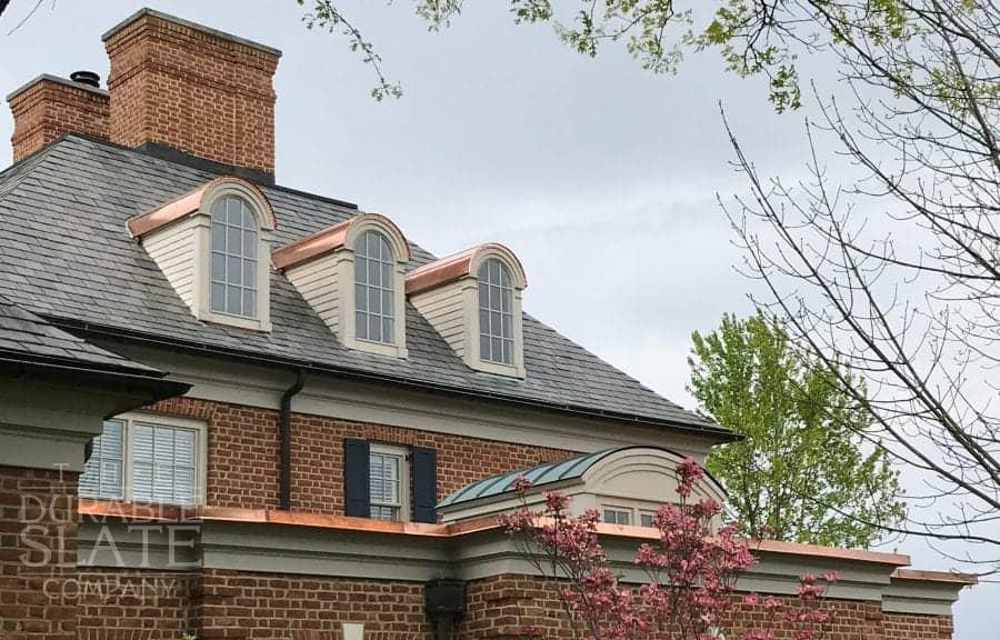 slate roof house with copper embellishments