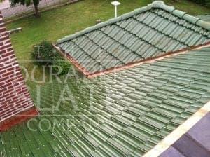 green clay tile roof with copper gutters and copper valleys