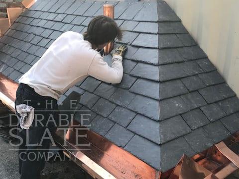 slate apprentice training on a durable slate mock-up roof