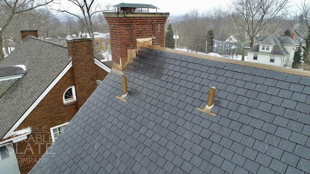 slate roofing, copper vent pipes, and copper flashing work in akron ohio