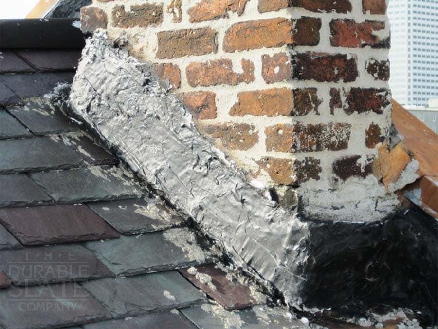 a bad chimney repair without copper flashing and leaks