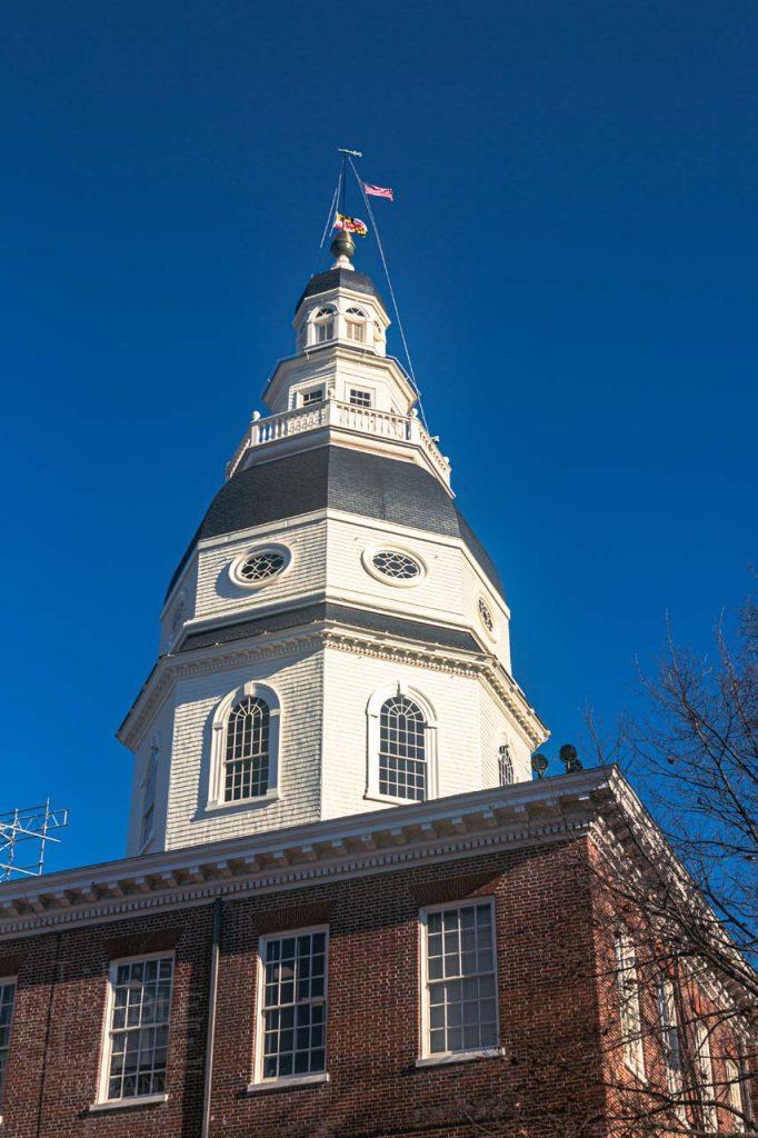 a large brick building with a clock tower