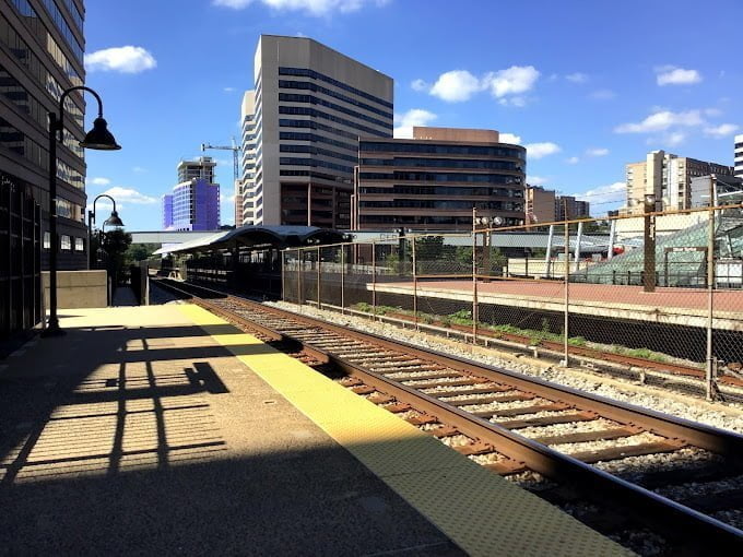 a train on a track in the city