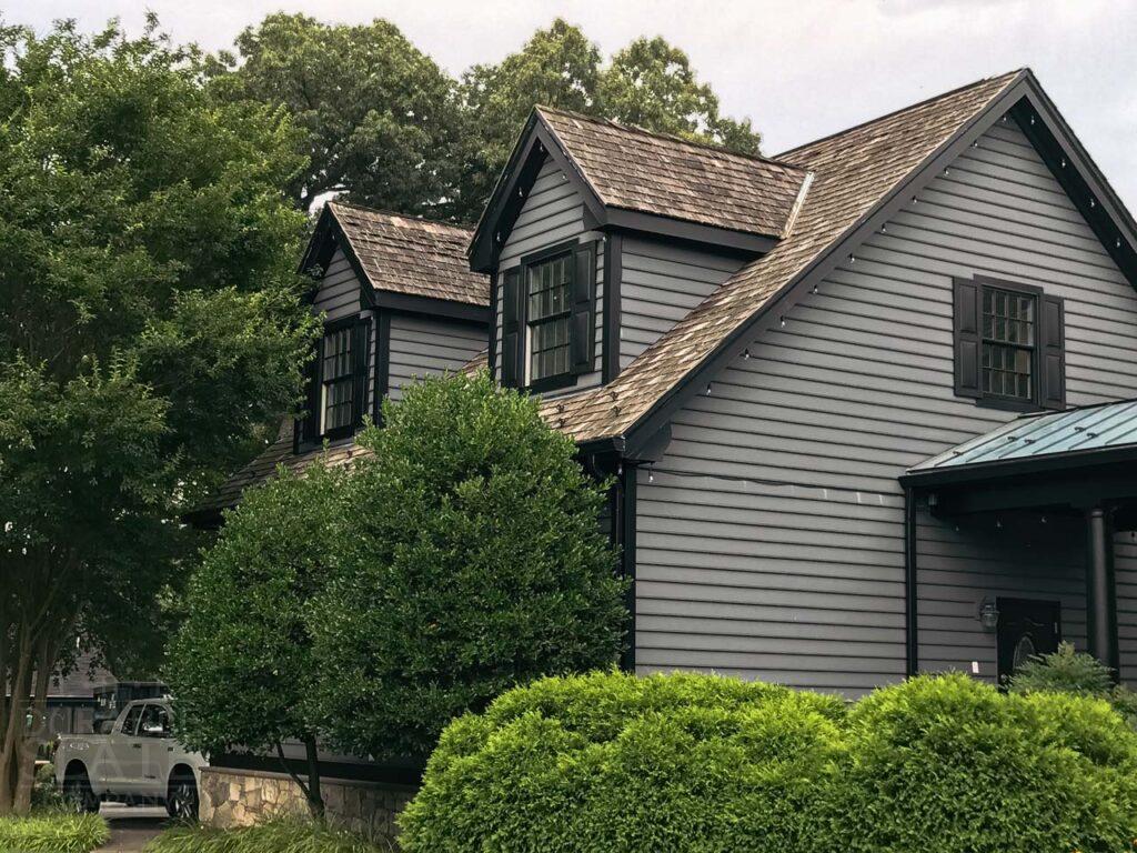 a house with trees in the background