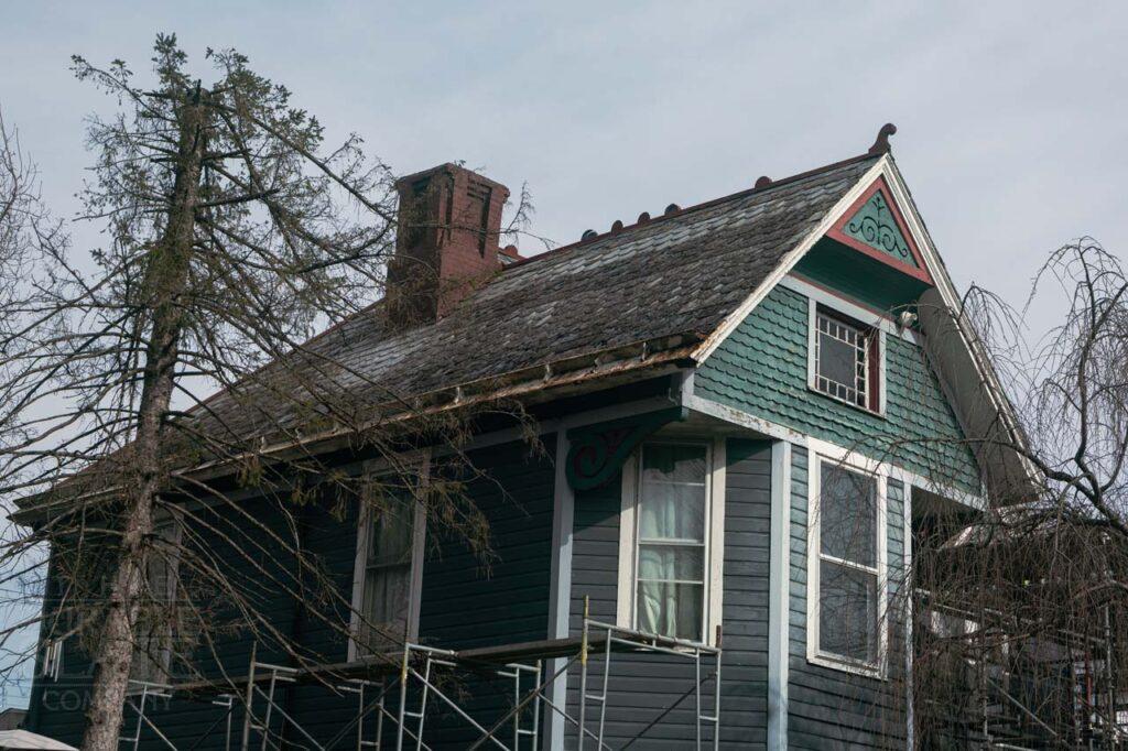 a house with trees in the background