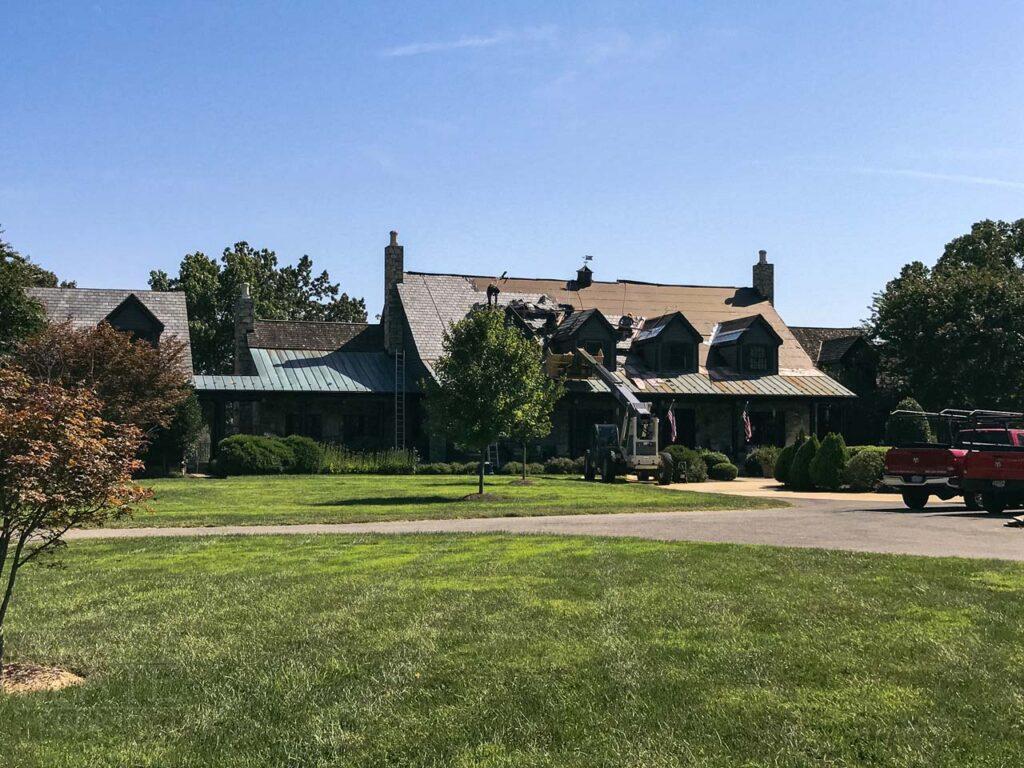 a house in the middle of a field