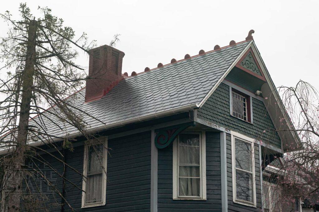 a house with trees in the background