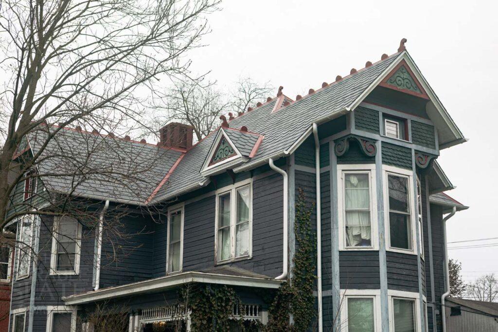 a house with trees in the background