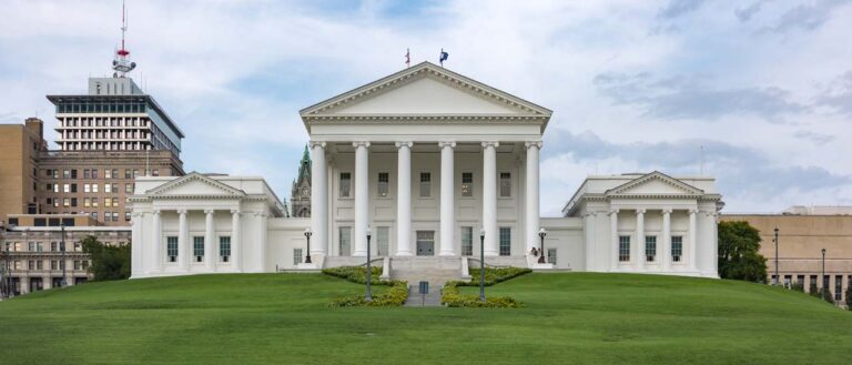 a large lawn in front of Virginia State Capitol