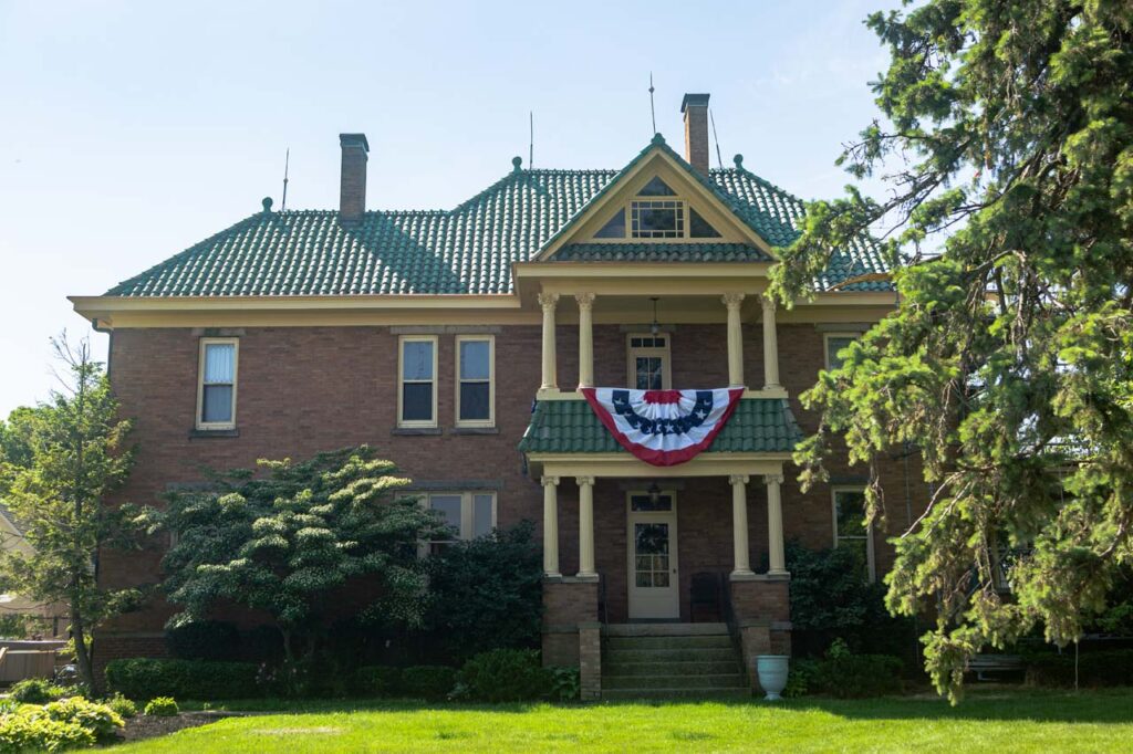 a house with trees in the background